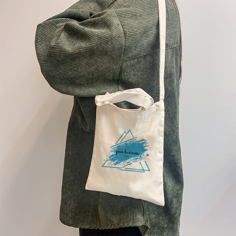 Your Business Tagline Mini Canvas Tote-bag, Custom our iTee template and make it yours. Model View